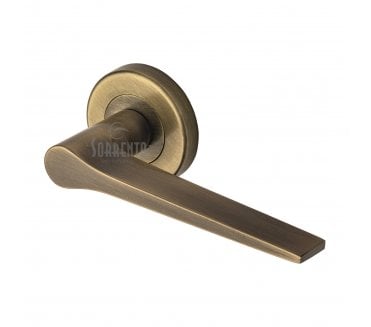 Sorrento SC-3059 Neo Door Handles On Round Rose - Antique Brass