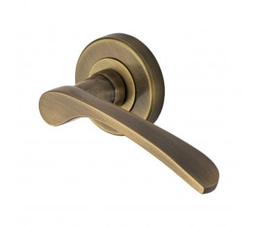 Sorrento SC-5380 Arcadia Door Handles On Round Rose - Antique Brass