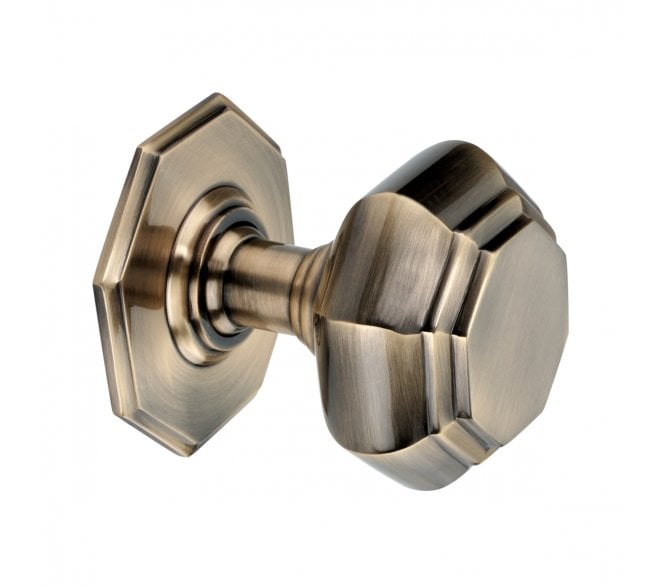Spira Brass Octagonal Centre Door Knob - Antique Brass