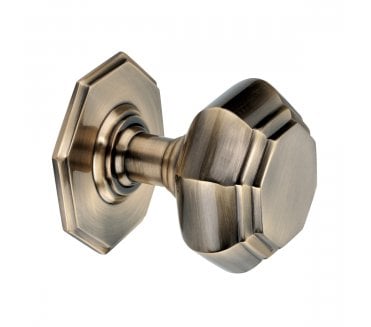 Spira Brass Octagonal Centre Door Knob - Antique Brass