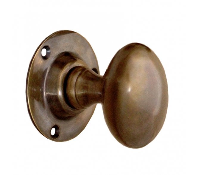 Spira Brass Oval Mortice Door Knobs - Natural Antique