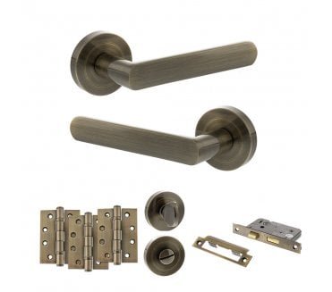 STATUS Carolina Door Handle Bathroom Pack (4 Fire Rated Hinges x3) - Antique Brass