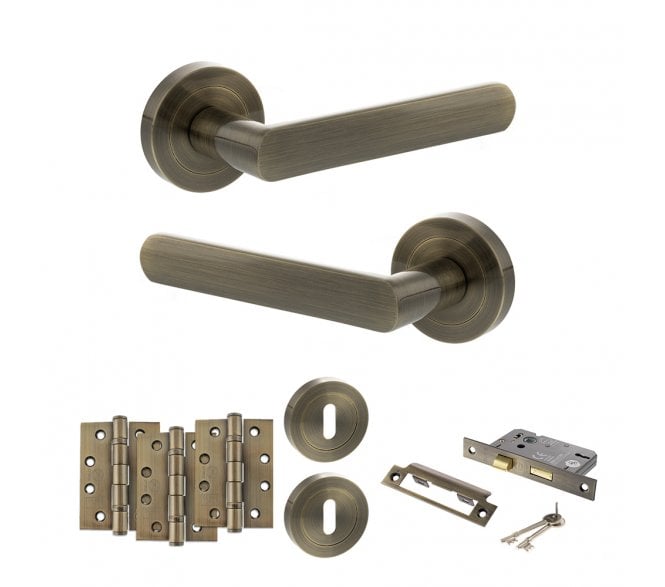 STATUS Carolina Door Handle Lock Pack (4 Fire Rated Hinges x3) - Antique Brass
