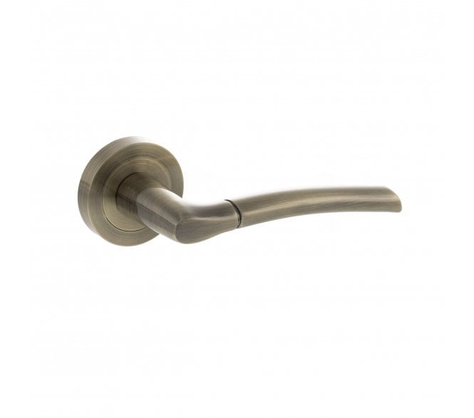 STATUS Indiana Lever Door Handle on Round Rose - Antique Brass