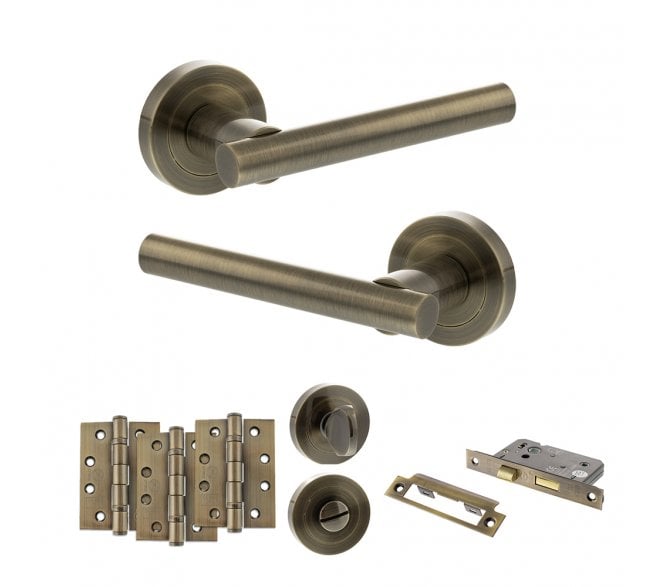 STATUS Nebraska Door Handle Bathroom Pack (4 Fire Rated Hinges x3) - Antique Brass