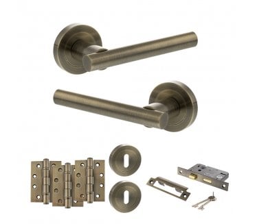 STATUS Nebraska Door Handle Lock Pack (4 Fire Rated Hinges x3) - Antique Brass
